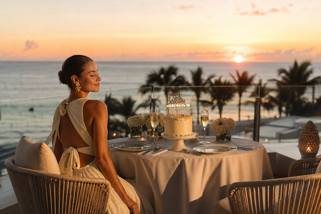 Resort terrace birthday table at sunset with cake and ocean view